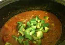 Stir through green peppers into this easy pumpkin chili just prior to serving