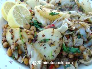 Cabbage salad recipe tossed with spices, coriander and coconut.