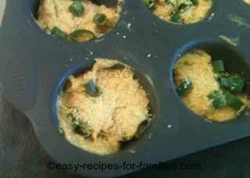 Spoon the batter for these easy pumpkin muffins into muffin trays 