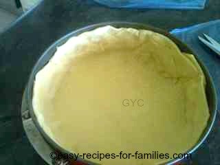 The tops of the edges of this home made pumpkin pie are fairly even