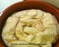 Swirled rolls of filled filo pastry rolls