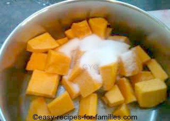 Stew the prepared pumpkin pieces in sugared or salted water