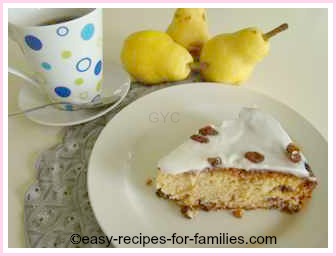 a slice of sultana cake with hot tea